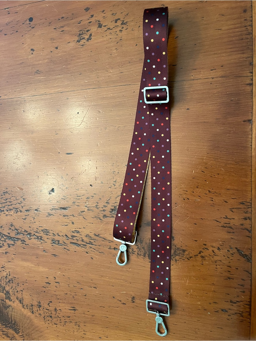 Harveys Click n’ Carry Seatbelt Crossbody Strap - Chocolate Brown w/Multi Dots - Picture 2 of 2